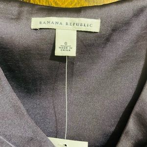 Purple satin sleeveless tops.